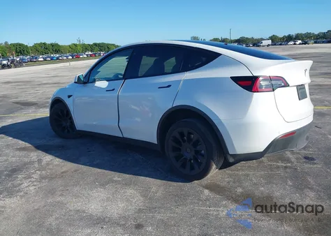 2022 Tesla Model Y из США, поврежденный, VIN 7SAYGAEEXNF468922